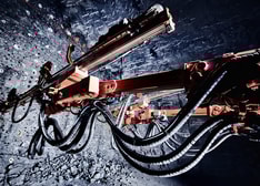 Tunneling jumbo's booms in mine