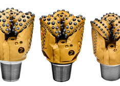 Three rotary drill bits white background