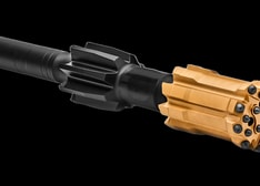 Top hammer drilling tools