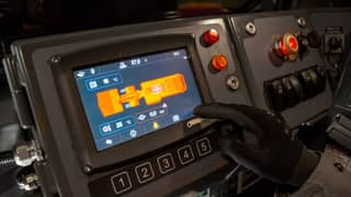 Toro™ LH307 underground loader with person in cabin