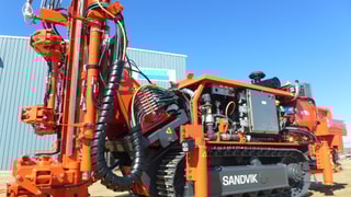 DU211-T Tracked in-the-hole production drill rig robust carrier