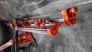 DT923i Tunneling jumbo rod handling system