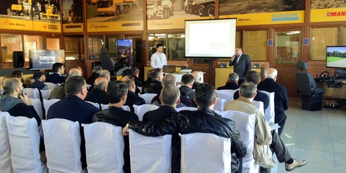 Guests enjoying a customer case study presentation