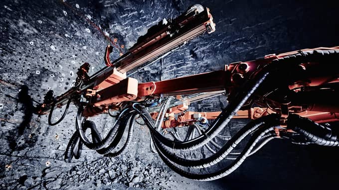 Tunneling jumbo's booms in mine