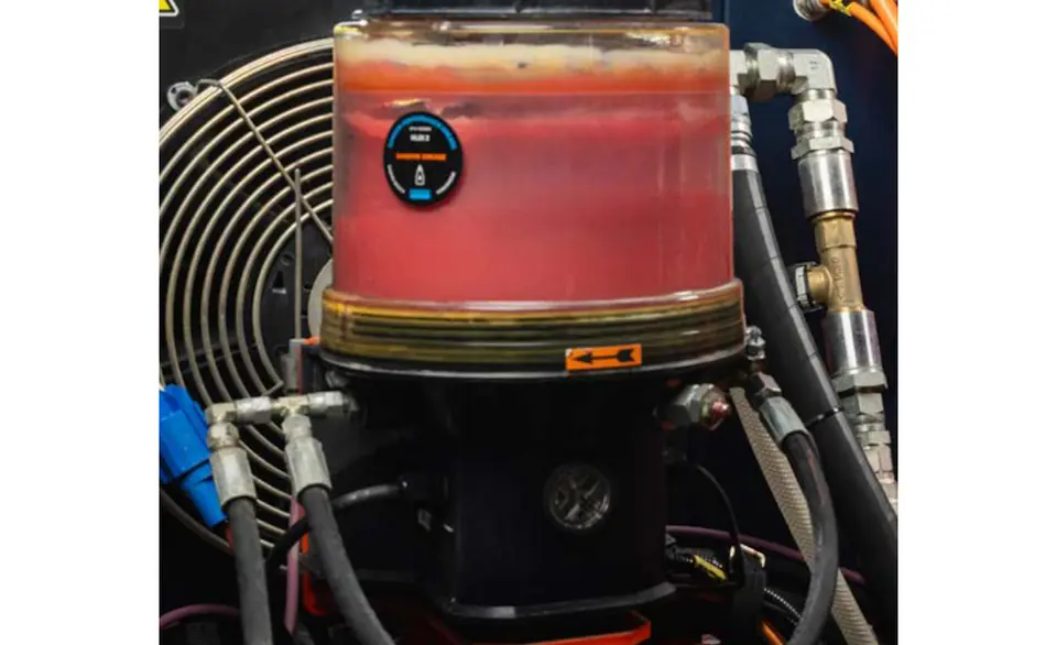 Automatic greasing system for tunneling drills