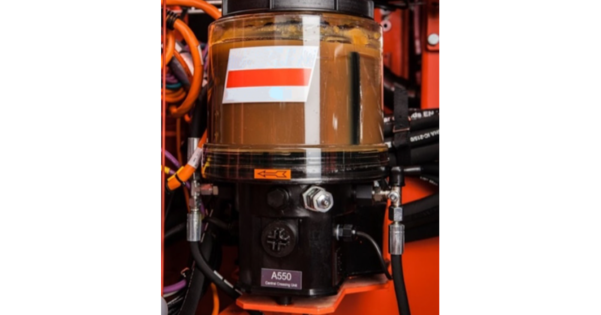 Automatic greasing system for tunneling drills