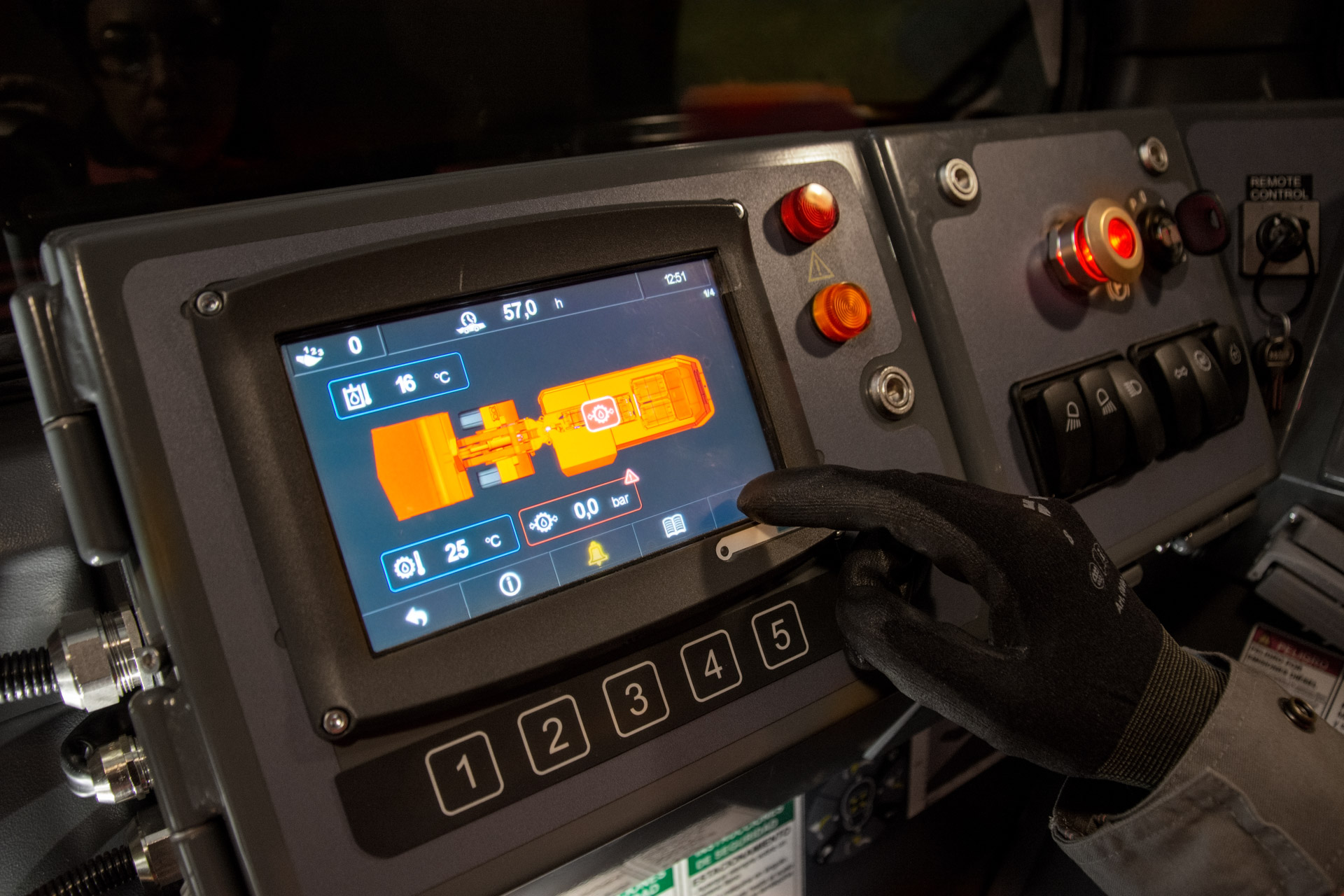 Toro™ LH307 underground loader with person in cabin