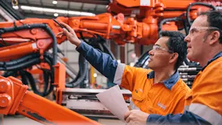 People inspecting UGD rig booms