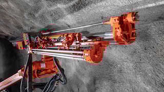 DT923i Tunneling jumbo rod handling system